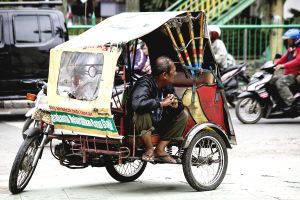 Trishaw Driver Waiting for Customers 